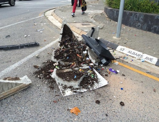 A dustbin that the taxi also knocked into. 