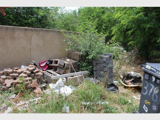 Building material dumped on a plot in Jan Smuts Avenue which belongs to the City.