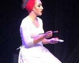 Serena Steinhauer performs on stage.