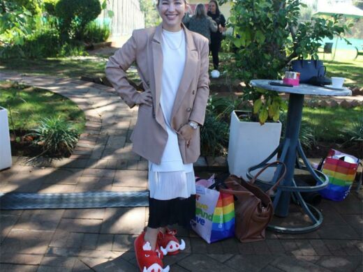 Roxy Burger is elated to be at the Reach For A Dream slipper day