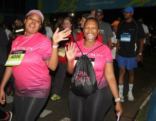 Happy runners feel the winning spirit in the air.
