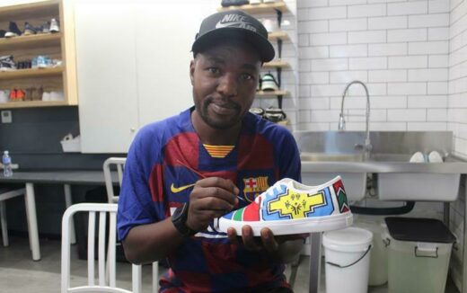 Derrick Mampuru does the final touches on one of the pair
