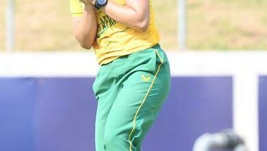 Lions cricketer Jenna Evans catches the ball