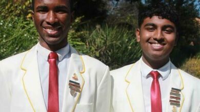 Xander Igbokwe and Orion Govender proudly wear their white honours blazers.
