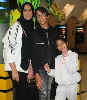 Khadija Mia, Muhammed and Nuha Gaffoor watch the movie as a family. Photo: Naidine Sibanda