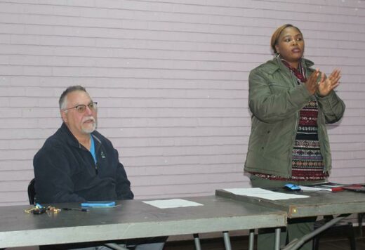 Ward 117 councillor Tim Truluck and Ward 117 administrator Buhle Tsotetsi guide residents on how to vote in their supplementary ward committee elections. Photo: Naidine Sibanda