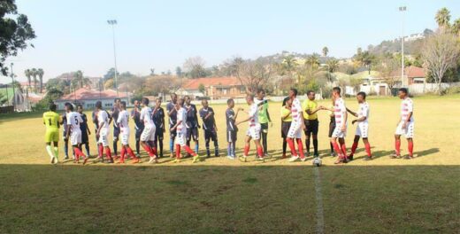 A handshake between Norwood Young Stars and Polokwane Rovers seals the beginning of the match. Photo: Naidine Sibanda