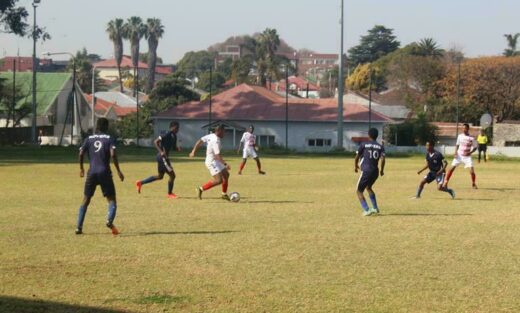 A massive defence mounts from Polokwane Rovers against Norwood Young Stars player with the ball. Photo: Naidine Sibanda
