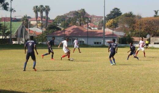 A massive defence mounts from Polokwane Rovers against Norwood Young Stars player with the ball. Photo: Naidine Sibanda