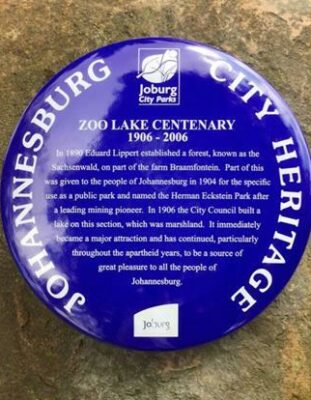 A duplicate blue plaque can be viewed close by the boat house at Zoo Lake.