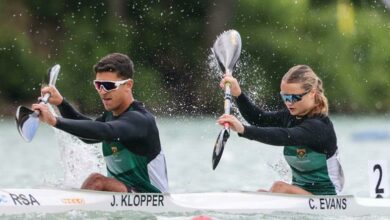St David's Marist Inanda learner Jordan Klopper and St Teresa’s School learner Caitlyn Evans paddle to the finish line.