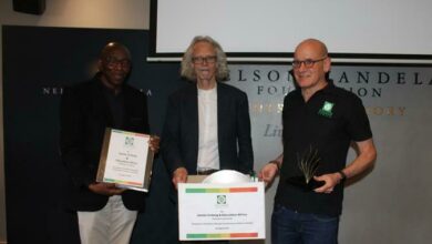 CEO of The Nelson Mandela Foundation Kananelo Makhetha, Professor Verne Harris and founder of Education Africa James Urdang display the memorabilia donated to the Nelson Mandela Foundation. Photo: Asanda Matlhare