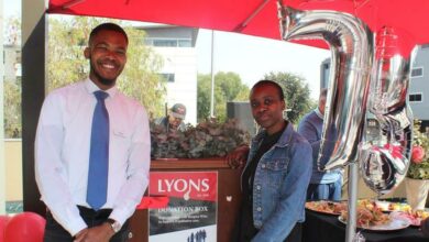 Mr Lyons staff members Thabo Masina and Kimberly Vundla share in the celebrations. Photo: Naidine Sibanda