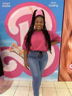 Wewe Nkese wears pink to show that she's a Barbie girl.