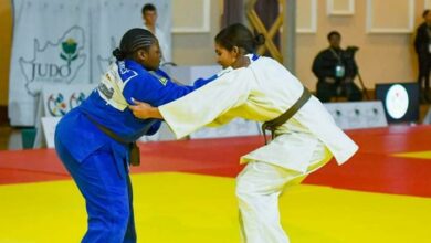 Jordyn Holmes (white) in action.