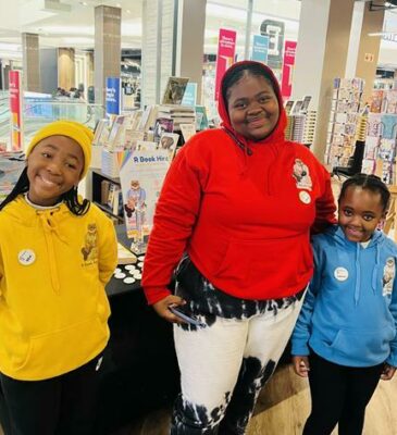 Reamoleboha Monethi, Oratile Moteane and Sibusiso Ndlovu are all smiles as they attend the R Book Hire book meeting.