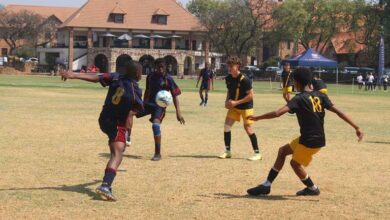 St John's Academy boys team-up to own the ball. Photo: Naidine Sibanda