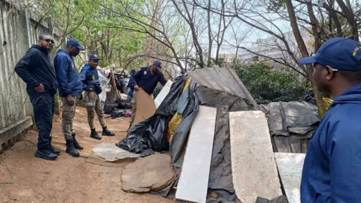 Police demolish the shacks found on the M1. Photo: Vision Tactical Facebook