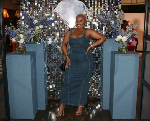 Zizipho Momoza flaunts her denim dress in the photo booth. Photo: Asanda Matlhare