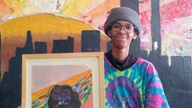 Brandon Bitros, one of the young people studying Community Art Counselling at Lefika La Phodiso prepares for the market.