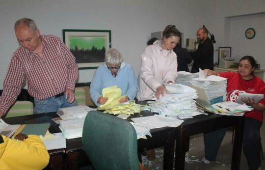 Etienne Malherbe, Helen Roberts, Shirley van Schalkwyk and Jade Jullies separate the paper by colours. Photo: Naidine Sibanda