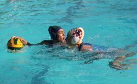 Humairaa Bodiat (Roedean) looks for a teammate as Gina Squazzin (St Stithians) is hard on her tail. Photo: Naidine Sibanda