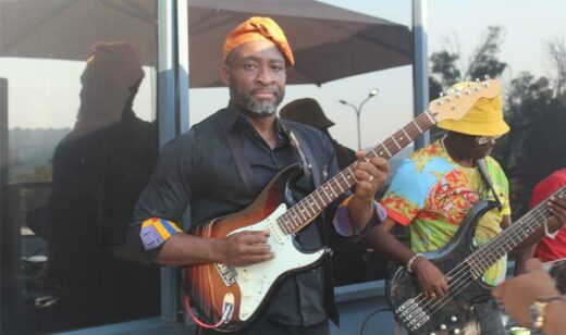 Band members Kunle Ayo and Frans Marule have their guitars ready for the performance. Photo: Naidine Sibanda