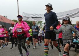 Despite the weather locals take part in the race.