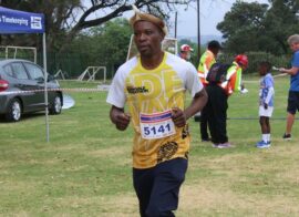 Owen Ndlovu.makes it across the finish line.