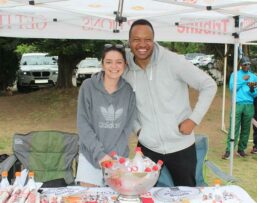 Rosebank Killarney Gazette partners with Rockies: editor Ashtyn Mackenzie and sales representative Sibusiso Khoza brave the cold to welcome the runners.