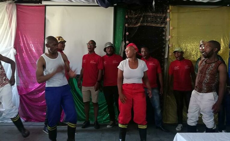 Abafana Bedlala Gumboot dancers perform for the audience.