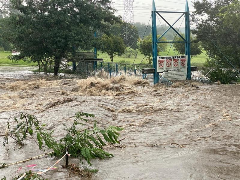 Months after severe storms damaged the Blue Bridge in Craighall Park, no repairs have begun. Residents continue to cross on a makeshift structure, risking injury while the city remains silent, unsure of whose responsibility the repairs are.