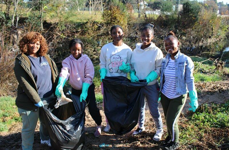 Residents and businesses rolled up their sleeves to restore their park, learn about water, and build a cleaner future.