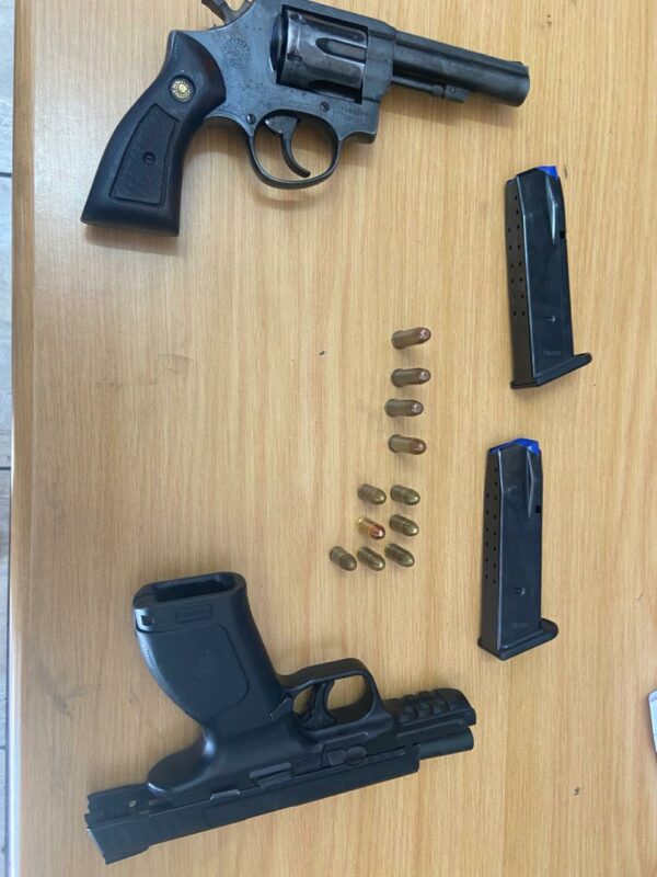 A tip-off from a vigilant resident led police to two suspects and unlicensed firearms, hidden in a flat in Norwood.