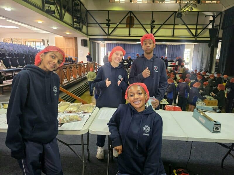 Grade 7 boys from the Ridge School and Grade 6 and 7 girls from St Katherine’s joined hands to pack meals for under-resourced early childhood development centres.