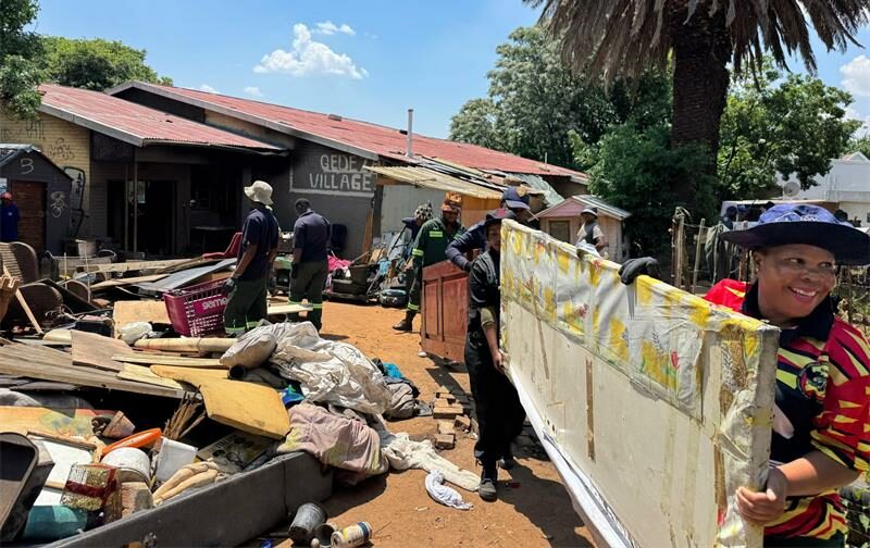 Law inforcement and private security remove illegal structures at the old Parkhurst bowling club on October 8, 2025. Photo: Supplied