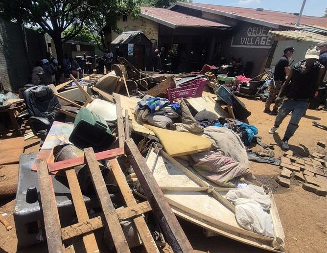 Piles of scrap material, wooden structures, and old furniture accumulated after the removal of the illegal dwellings and shacks on October 8, 2025 at the old Parkhurst Bowling Club. Photo: Supplied