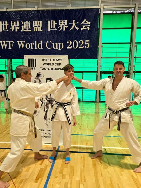 Senseis Malcolm and Shane Dorfman with their student Barrett Flinner on October 4, 2025. Photo: Supplied