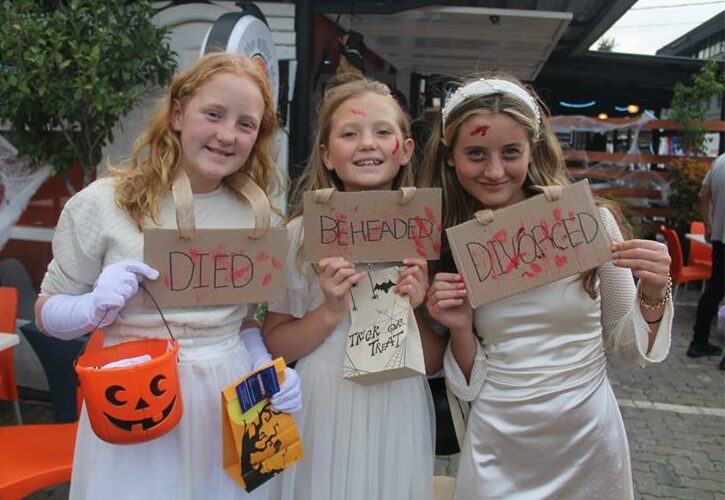 Families, friends, and pets turned out in creative costumes to enjoy Norwood's lively route.