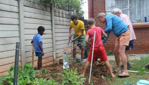 Boys from Abraham Kriel- Maria Kloppers Children's Home help plant vegetables as part of the Harvest of Hope Project on October 31, 2025. Photo: Supplied