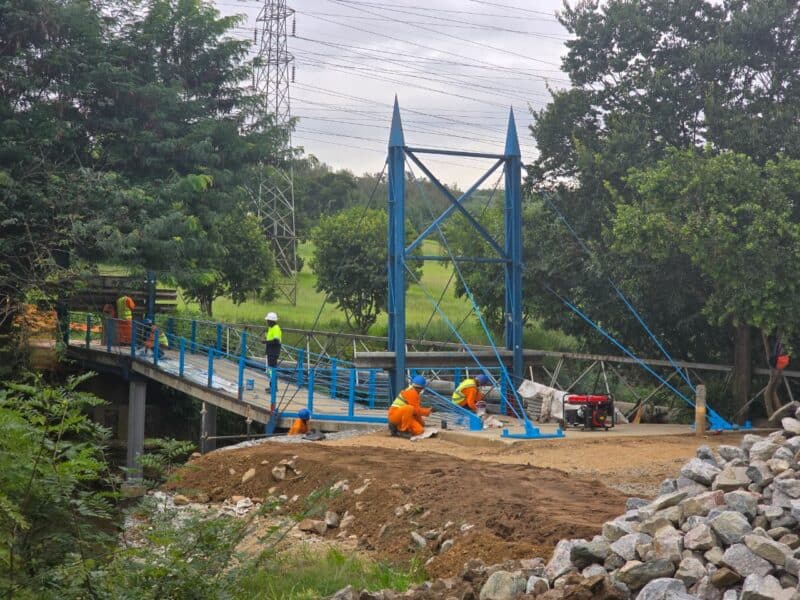 Months after flooding damaged the iconic Blue Bridge, residents are calling for transparency and accountability as repair delays continue.