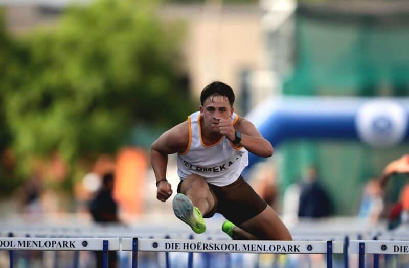 Teen athlete clocks world’s fastest U18 110m hurdles time this year and joins the all-time global top 10.