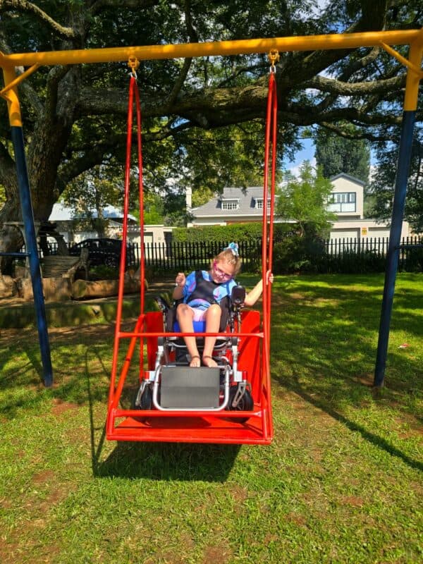 A simple swing, inspired by one little girl, is changing how children play together in Johannesburg.