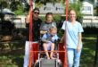 Lily with her parents, Sean and Robyn, and disabailty and support specialist, Erin Davis, at George Hay Park in Parkview on March 27, 2026. Photo: Naziya Davids-Easthorpe
