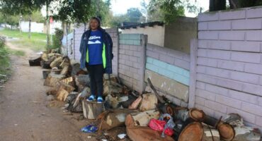 Ward 72 councillor, Belinda Kayser-Echeozonjoku, stands outside the illegally occupied house on April 20, 2026. Photo: Asanda Matlhar