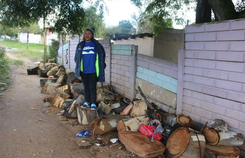 Ward 72 councillor, Belinda Kayser-Echeozonjoku, stands outside the illegally occupied house on April 20, 2026. Photo: Asanda Matlhar