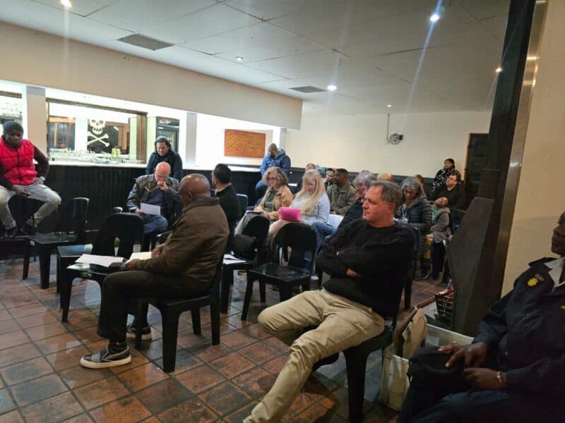 Residents raised concerns about vehicle theft, illegal car guards and police response times during a meeting at Pirates Club.