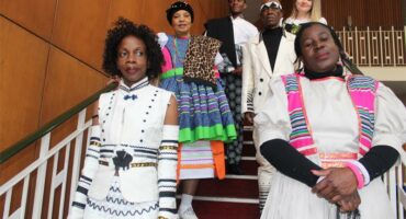 Thelma Sikazwe,Saziso Moyo, Elsie Dijana, Kolisile Ngali, Tumiso Mohale, and Anouk Heneck in their heritage outfits at their graduation ceremony at the Union of Jewish Women Empowerment Sewing School on June 18, 2026. Photo: Thato Modopi