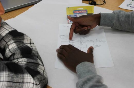 Team members explain how their prototype would work on June 22, 2026. Photo: Thato Modopi
