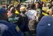 Community members gather at Cartrack in Rosebank seeking accountability from the company regarding an employee's death. Photo: Thato Modopi